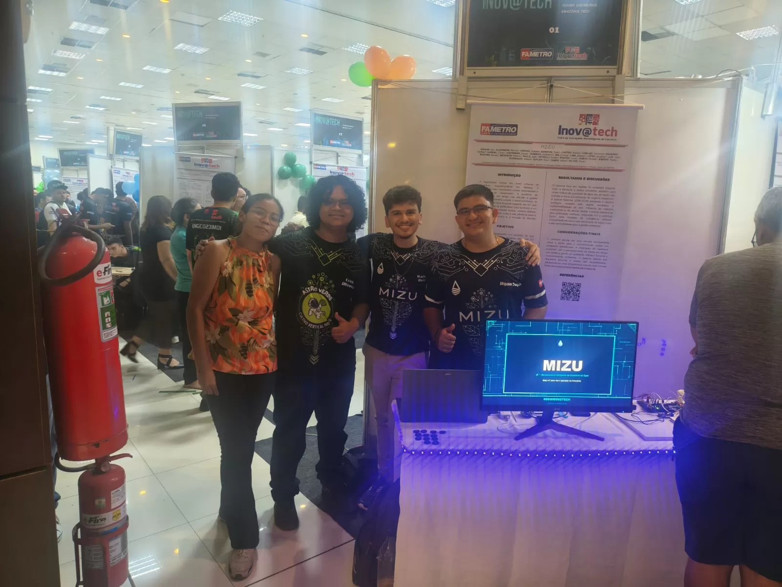 Foto com colaborador na Apresentação do dia 19/05/2026