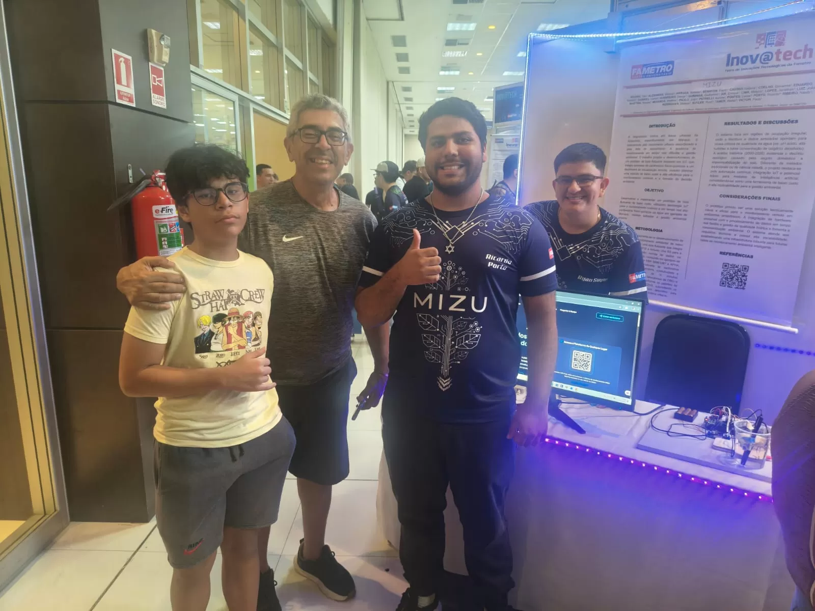 Foto com colaborador na Apresentação do dia 19/05/2026
