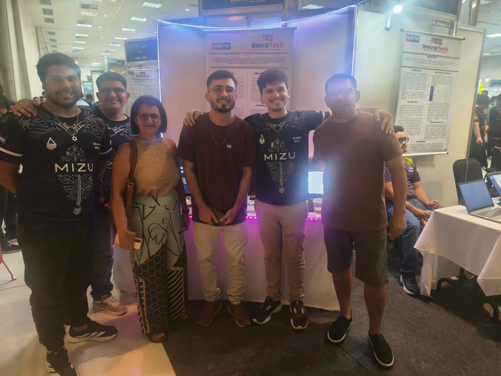 Foto com colaborador na Apresentação do dia 19/05/2026