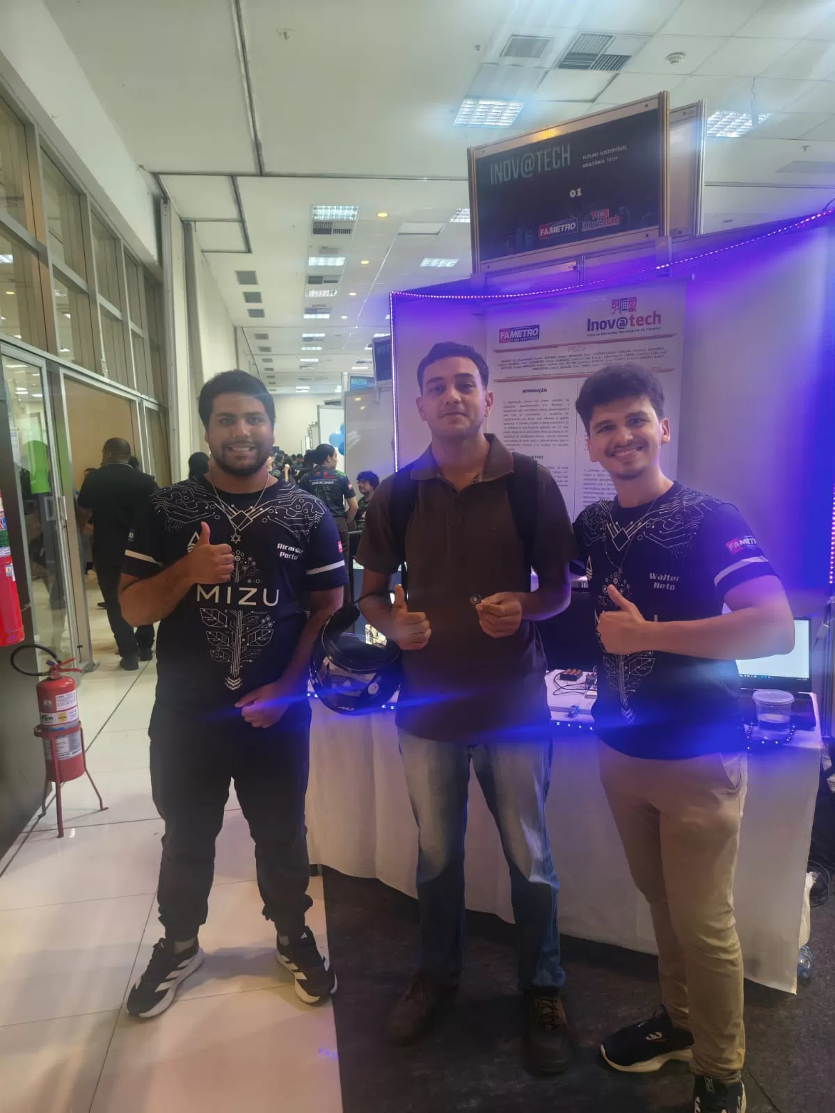 Foto com colaborador na Apresentação do dia 19/05/2026