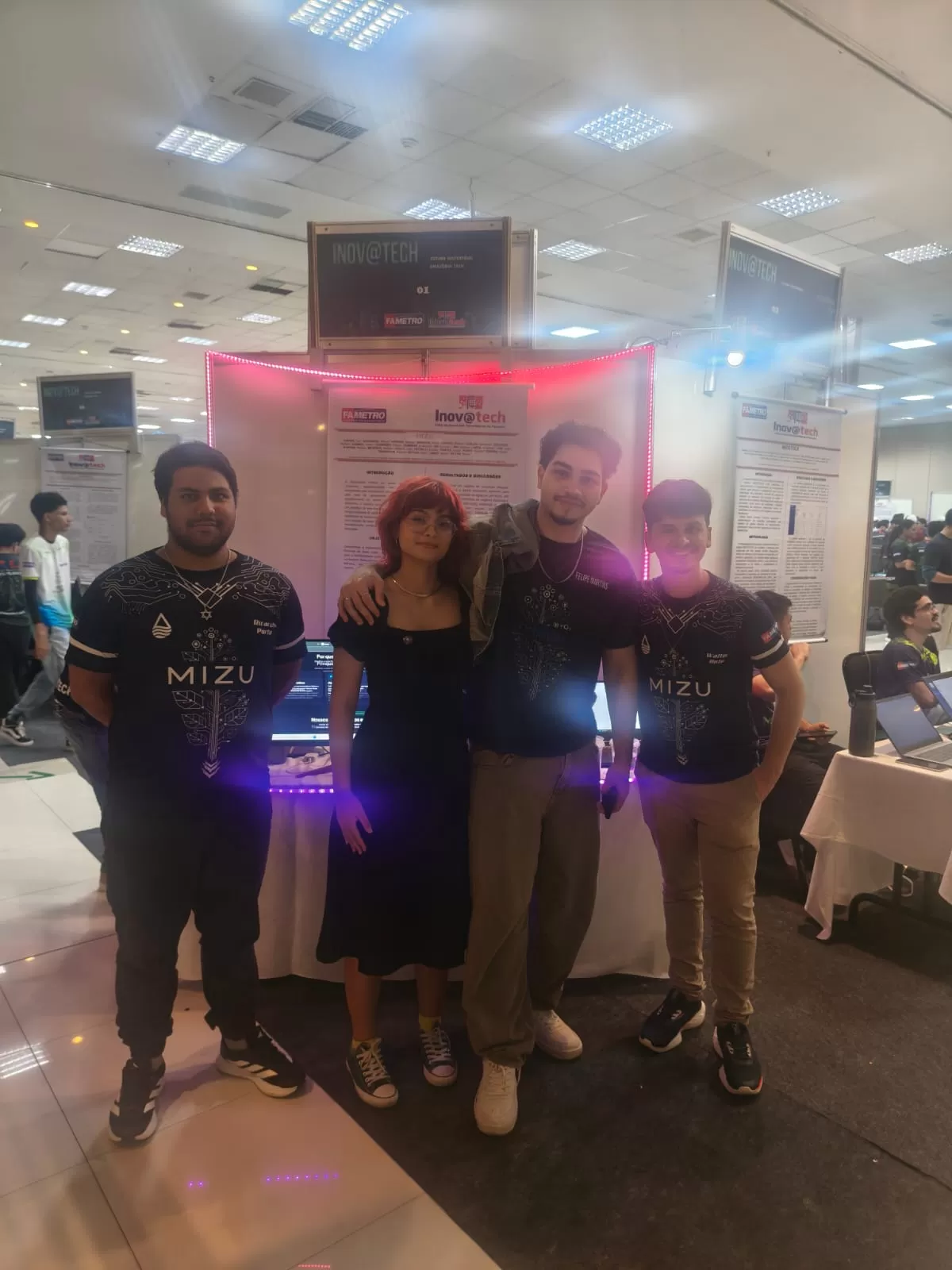 Foto com colaborador na Apresentação do dia 19/05/2026